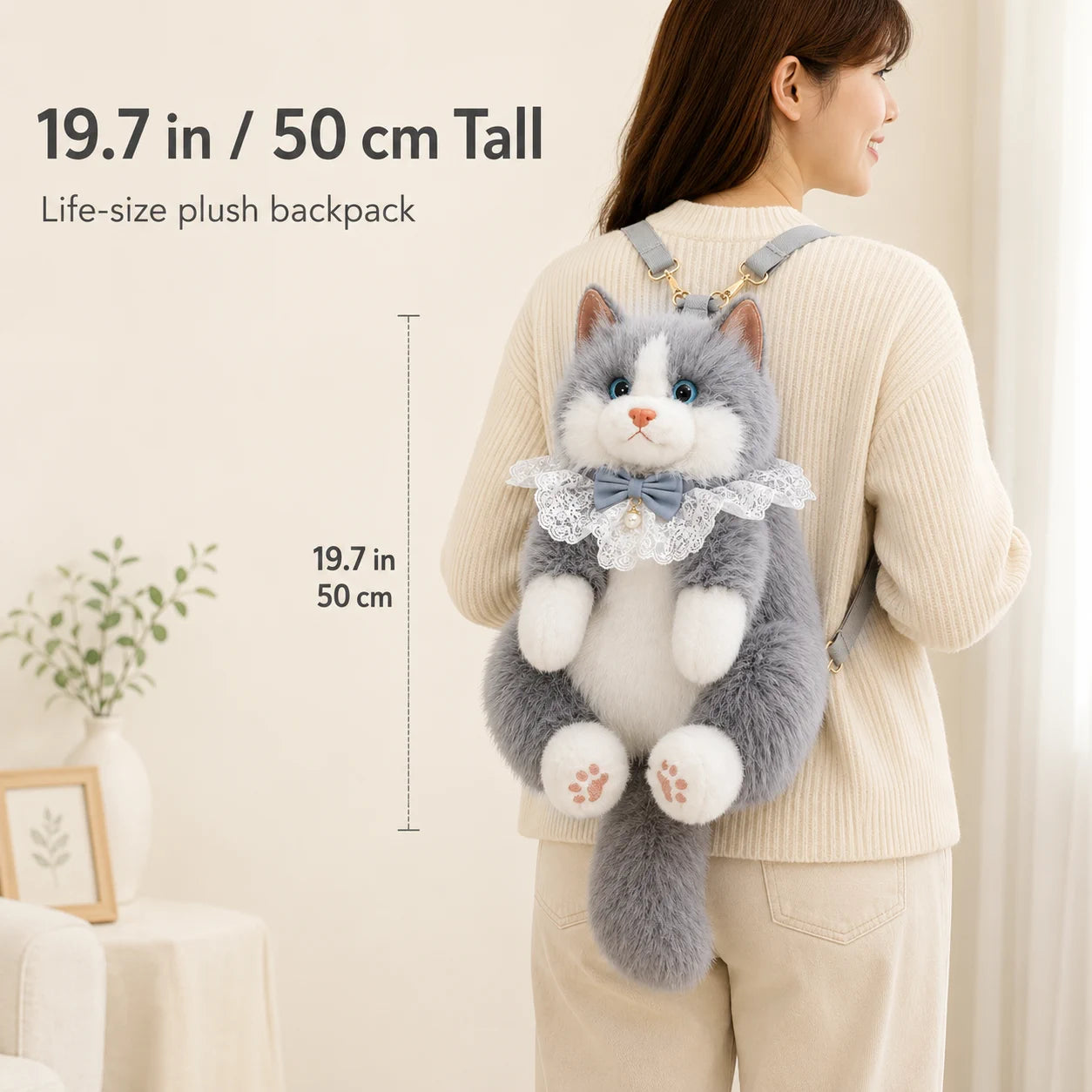 Model wearing the 19.7 inch plush cat backpack